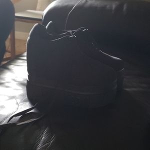 Black platform heeled sneakers